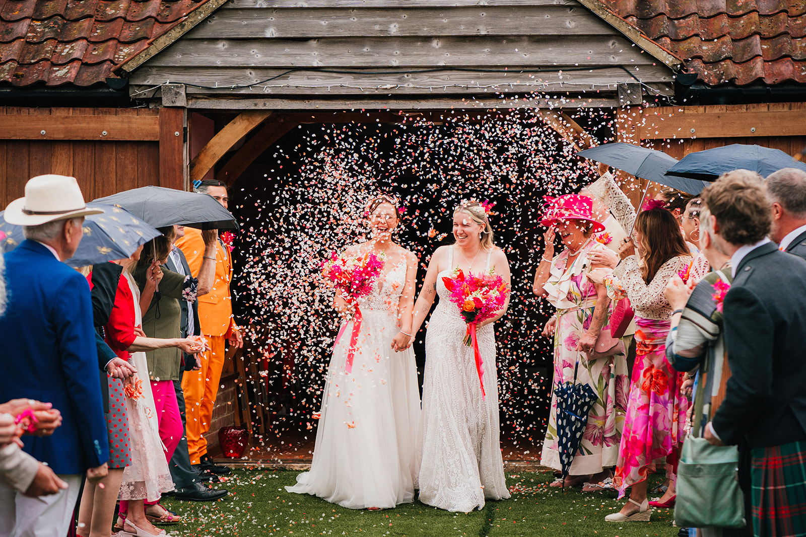 Photos from a colourful pink and orange glitter ball wedding near Westbury by Becky Weir Photography