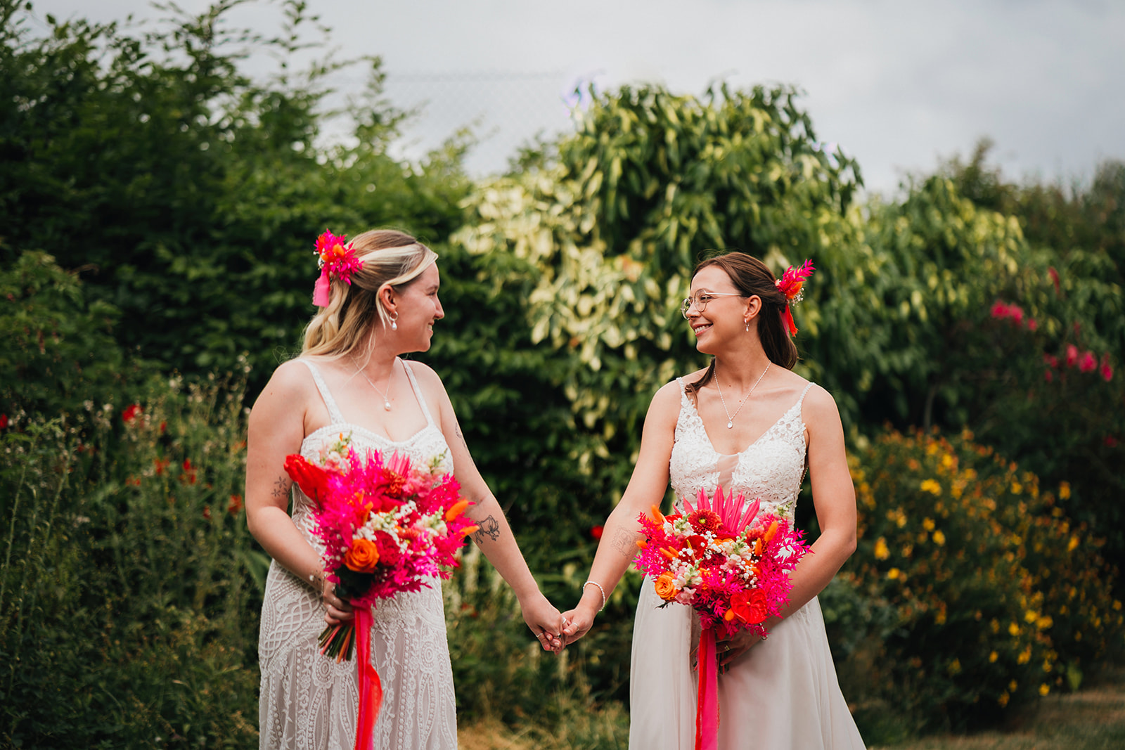 Photos from a colourful pink and orange glitter ball wedding near Westbury by Becky Weir Photography