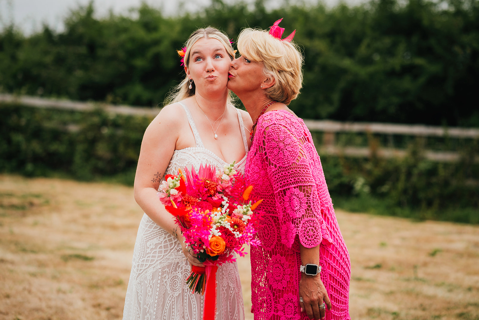 Photos from a colourful pink and orange glitter ball wedding near Westbury by Becky Weir Photography