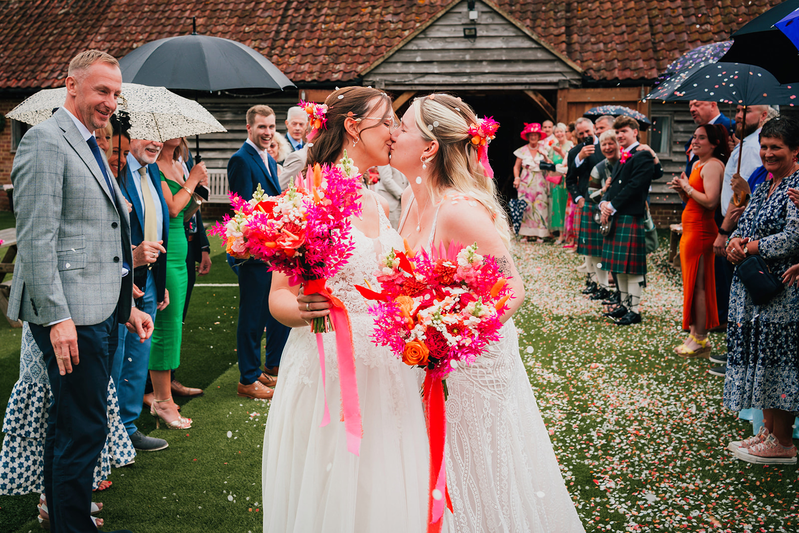 Photos from a colourful pink and orange glitter ball wedding near Westbury by Becky Weir Photography