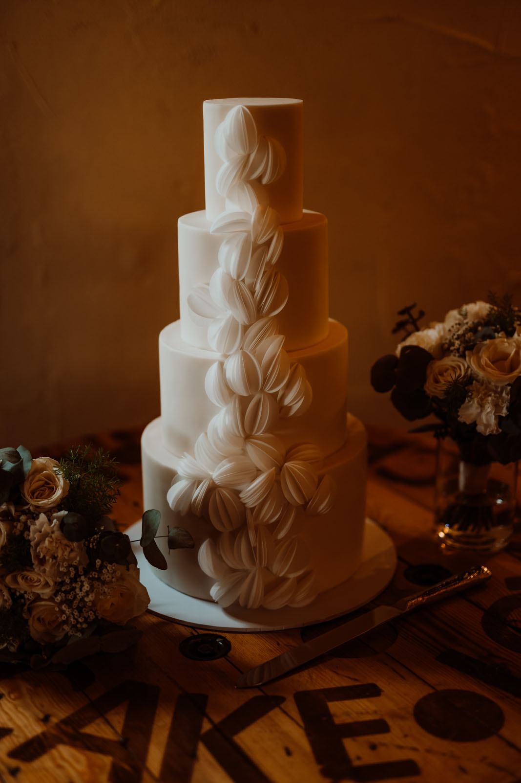 elegant modern wedding cake with 4 tiers and stunning modern wafer paper design
