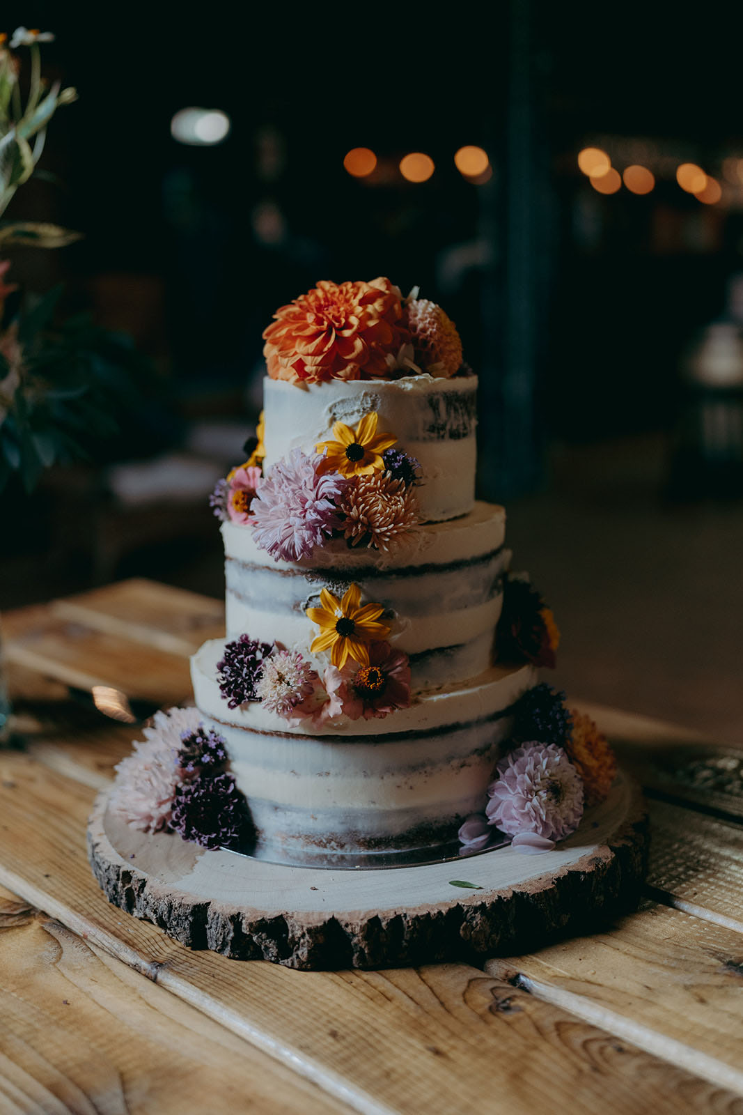 wedding cake with buttercream and autumn flowers