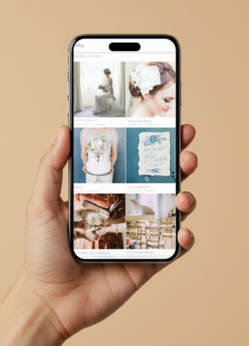 Placeholder image for the English Wedding directory showing a hand holding a mobile phone with the directory