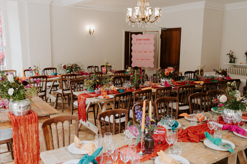 Colourful DIY wedding with streamers and stunning flowers at Colehayes Park South Devon with Hannah Timm Photography