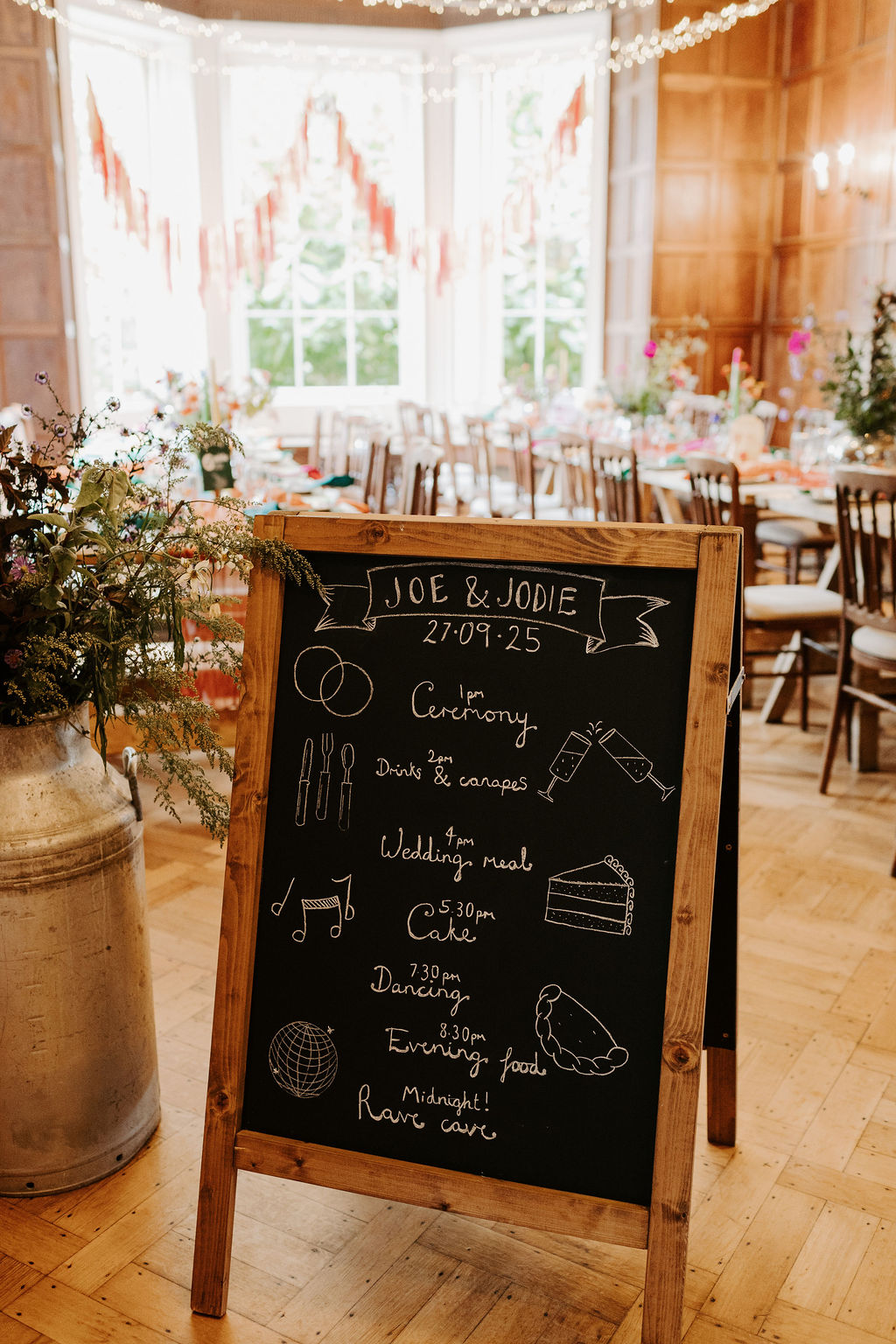 Colourful DIY wedding with streamers and stunning flowers at Colehayes Park South Devon with Hannah Timm Photography