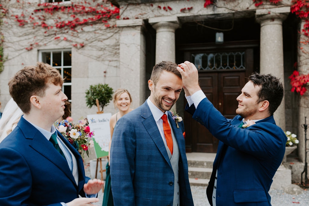 Colourful DIY wedding with streamers and stunning flowers at Colehayes Park South Devon with Hannah Timm Photography