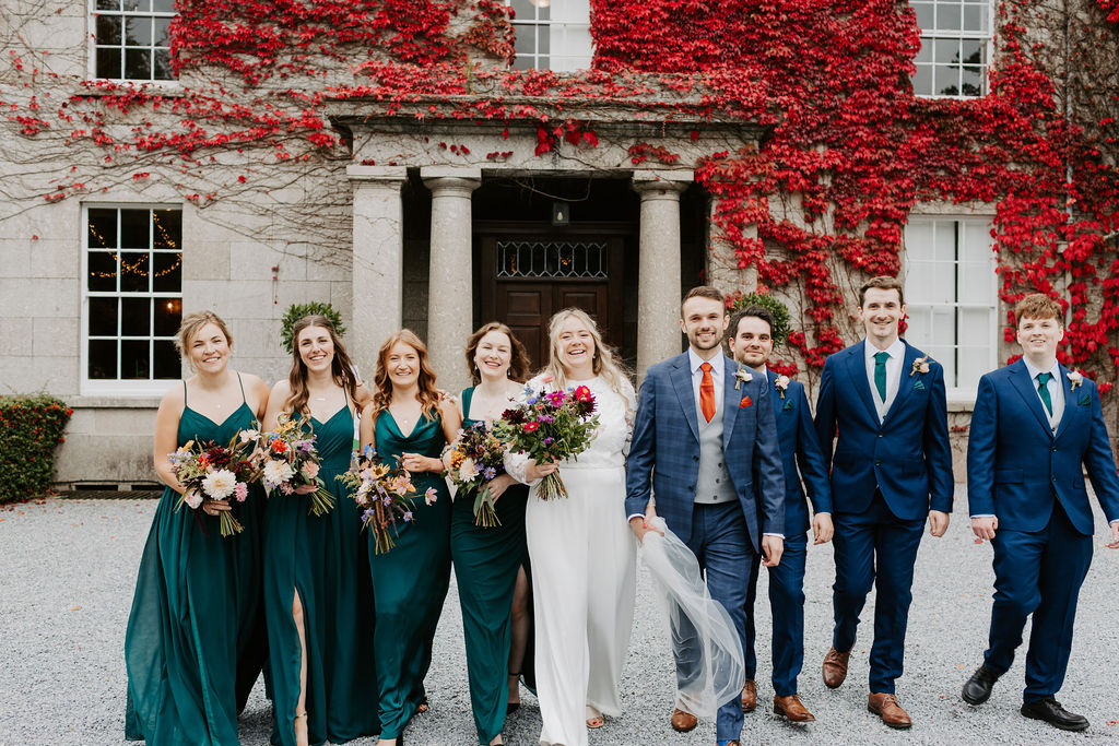 Colourful DIY wedding with streamers and stunning flowers at Colehayes Park South Devon with Hannah Timm Photography