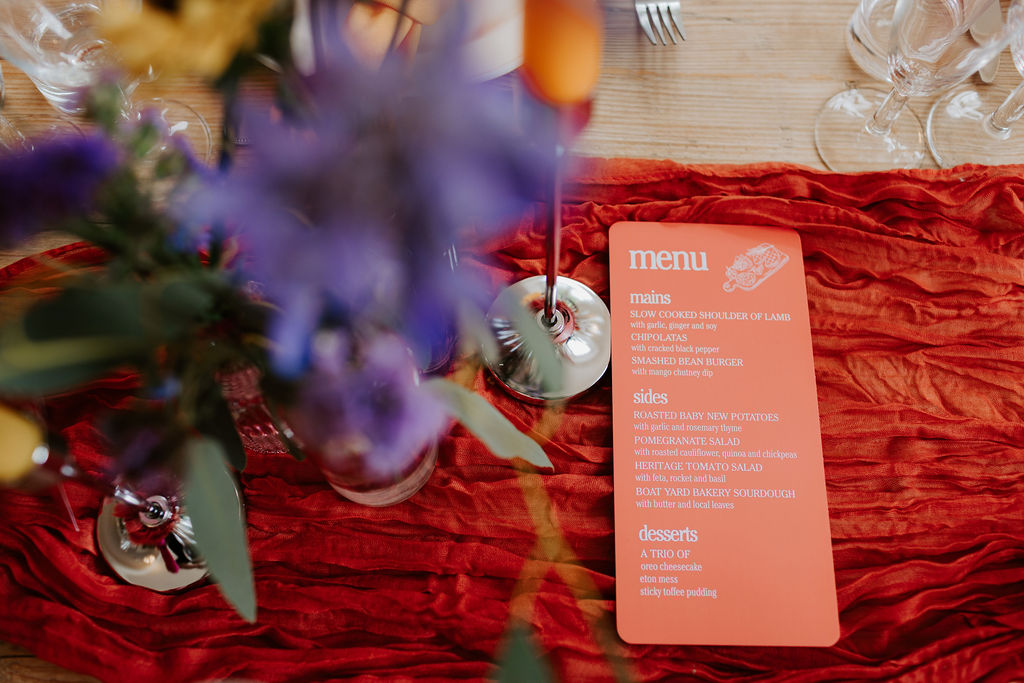 Colourful DIY wedding with streamers and stunning flowers at Colehayes Park South Devon with Hannah Timm Photography