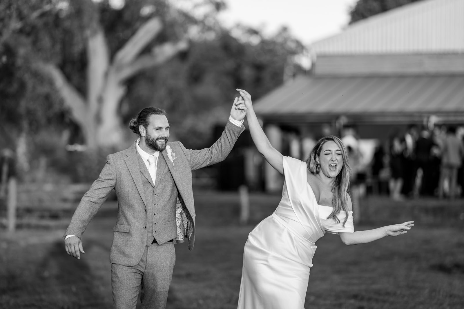 Fun, relaxed, natural wedding vibes with a groom and bride dancing at The Oak Barn - Benjamin Toms Photography | Kent