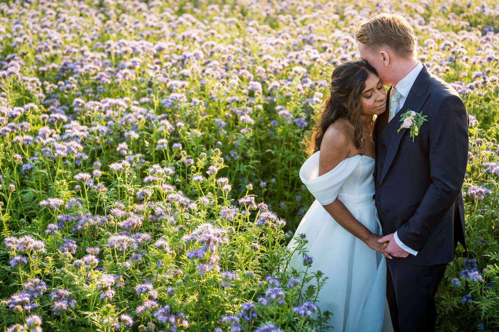 golden sunlight for a bride and groom at The Old Kent Barn - Benjamin Toms Photography | Kent