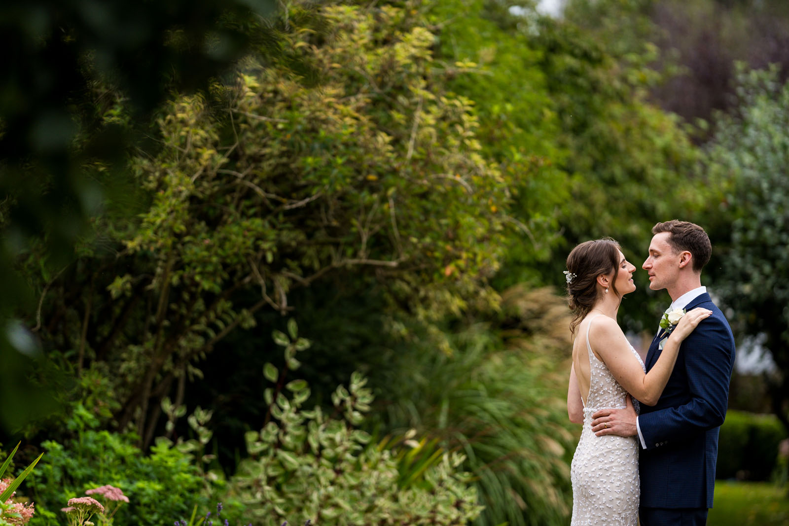 Lush greenery is the backdrop for The Secret Garden venue - Benjamin Toms Photography | Kent