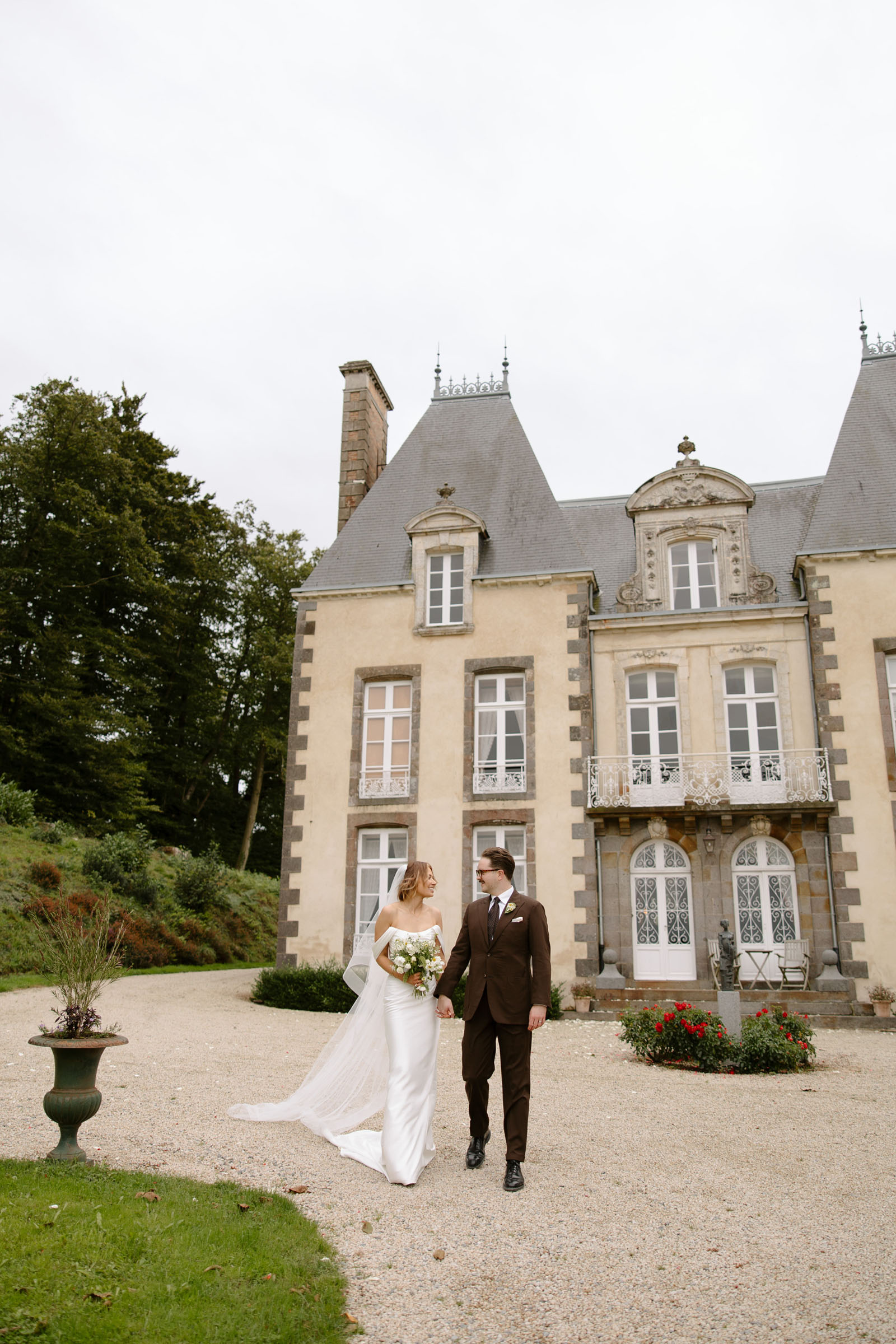 Wedding photographer in France capturing sunset portraits at a Brittany destination wedding