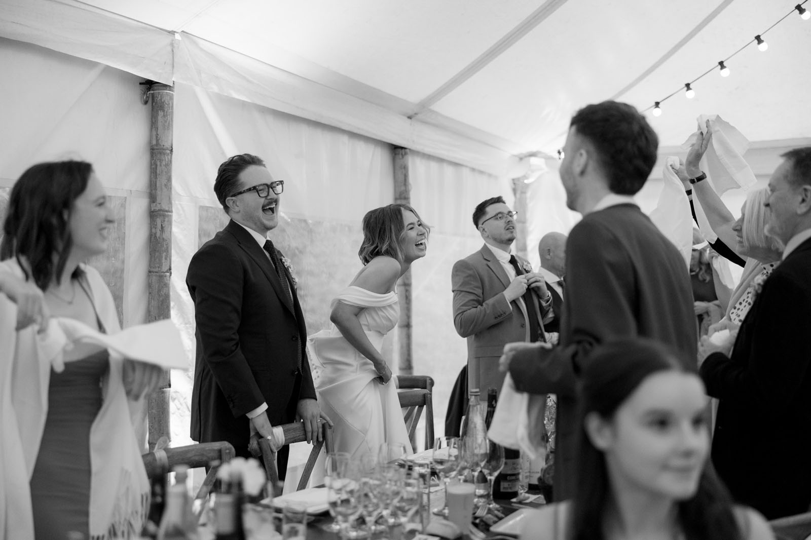Brittany destination wedding reception with joyful atmosphere captured by wedding photographer in France