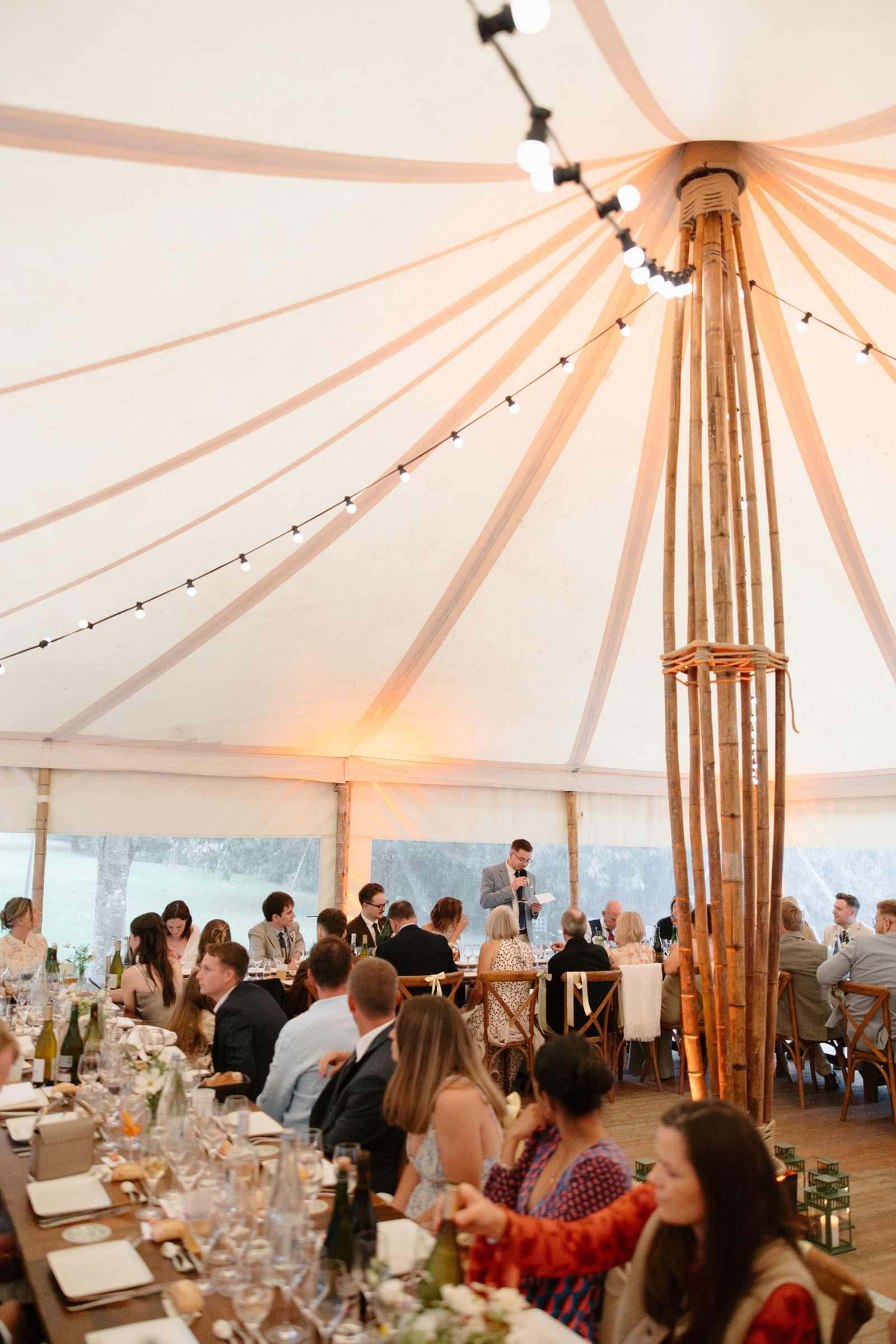 Relaxed French destination wedding dinner setting with elegant styling in the French countryside