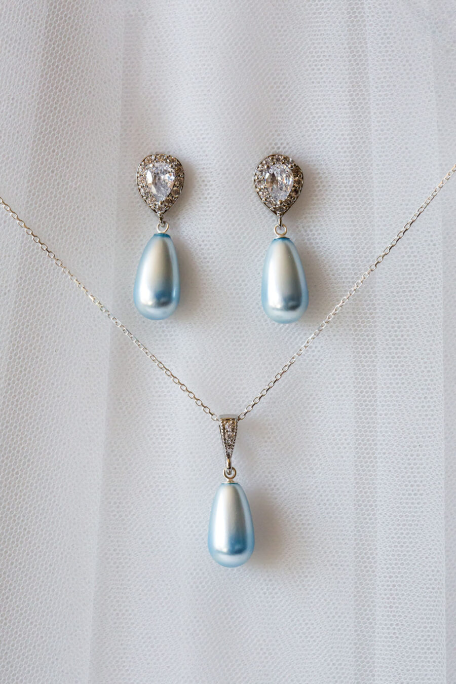 Soft blue pearl and crystal bridal jewellery set with earrings and necklace by Emma Rose Treasures UK