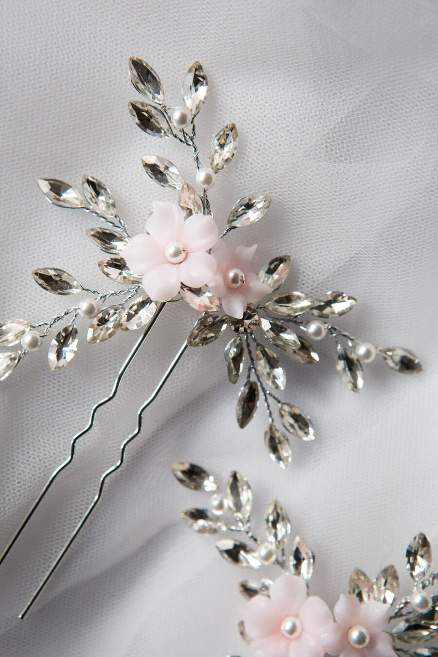 Delicate bridal hair pins with baby pink flowers and silver crystals by Emma Rose Treasures UK