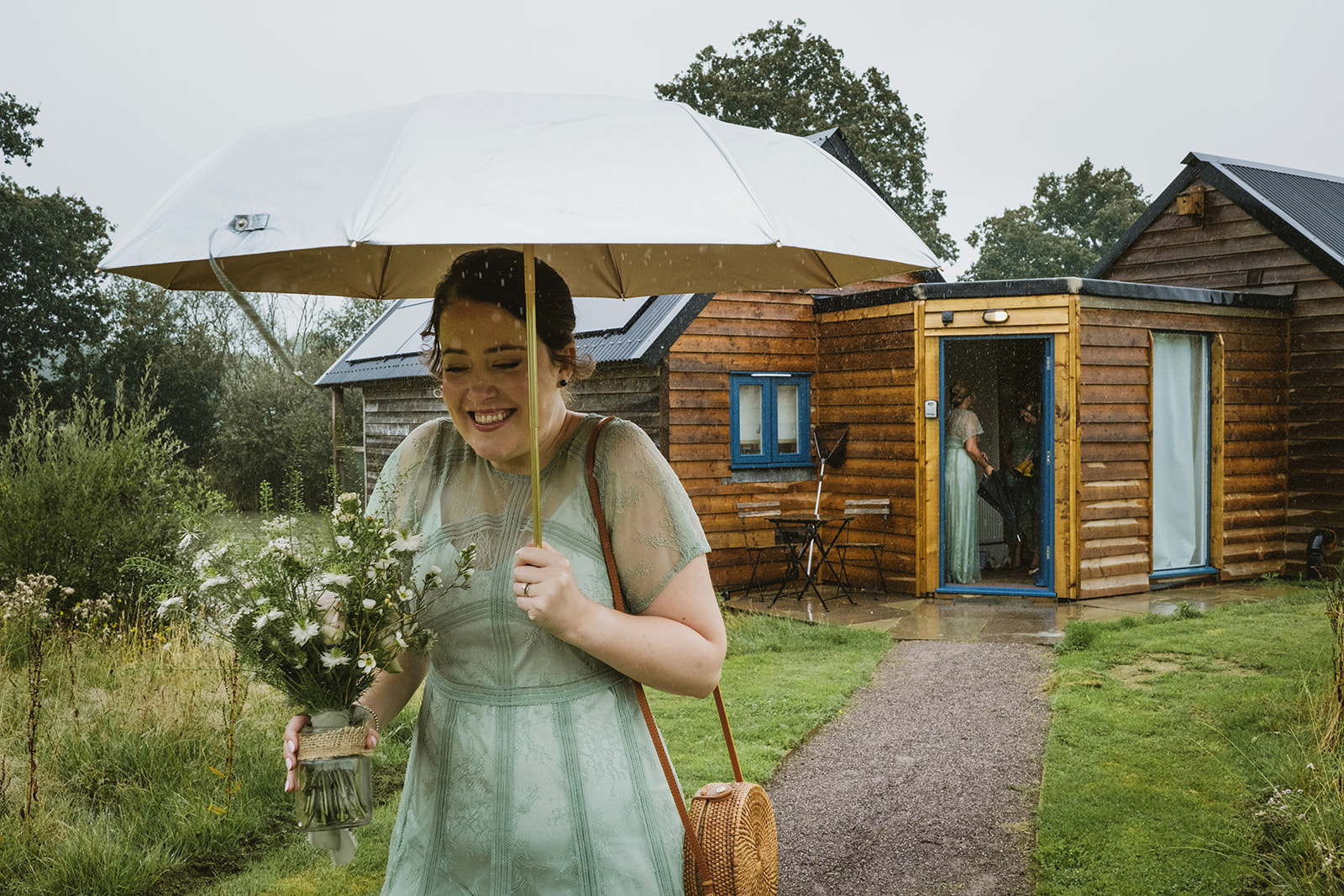 rainy outdoor garden wedding in Kent with candid photography by York Place Studios