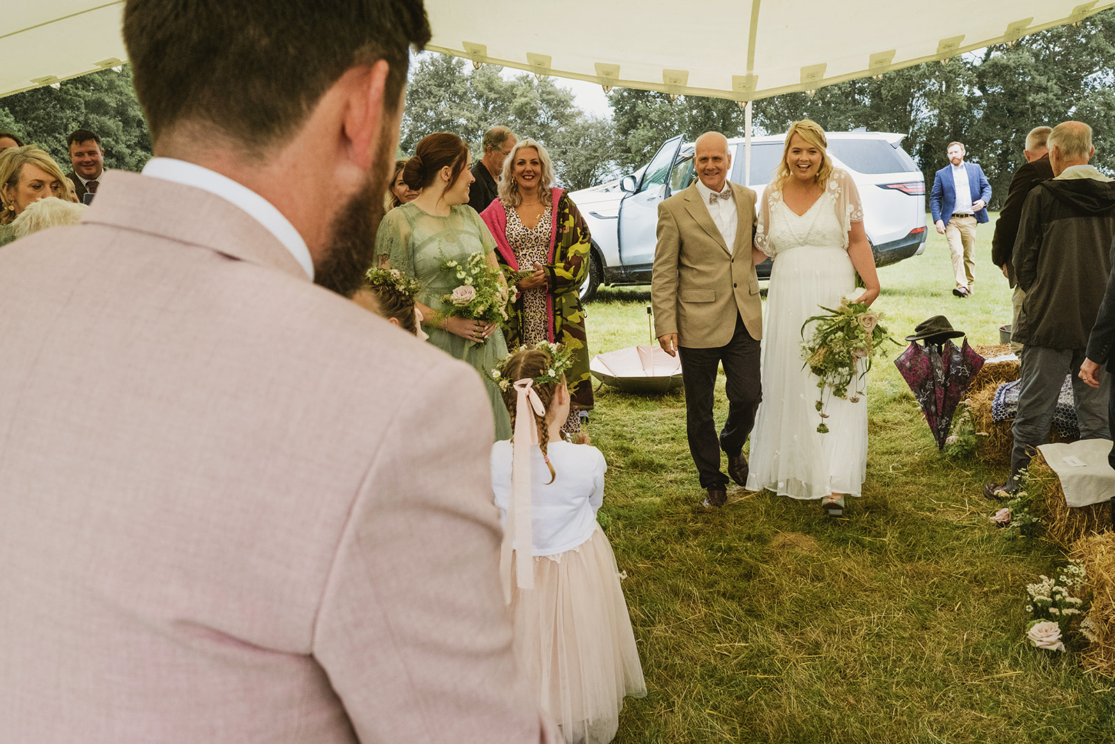 rainy outdoor garden wedding in Kent with candid photography by York Place Studios