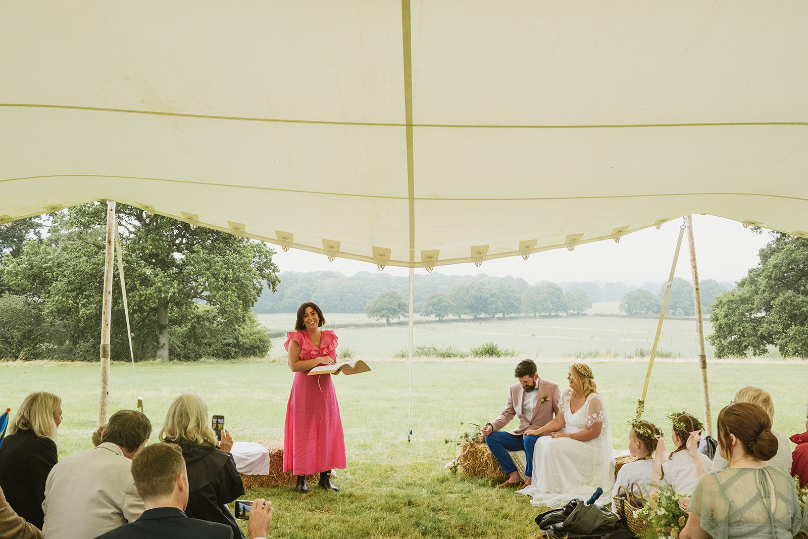 rainy outdoor garden wedding in Kent with candid photography by York Place Studios