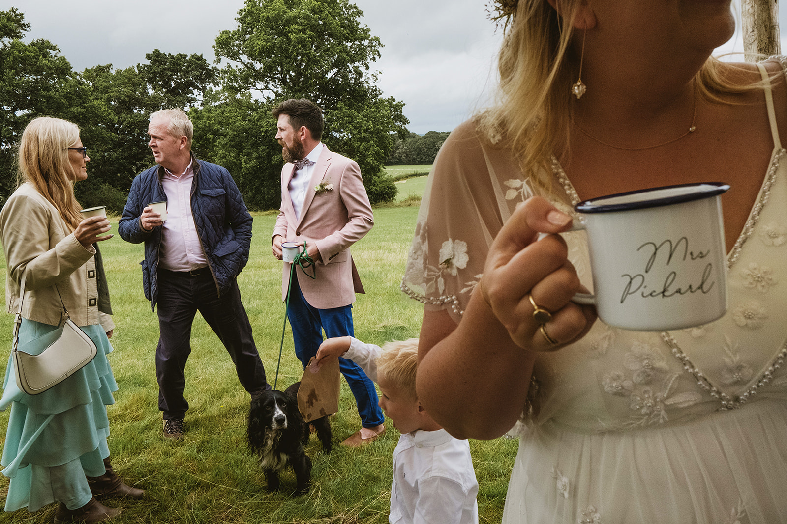 rainy outdoor garden wedding in Kent with candid photography by York Place Studios