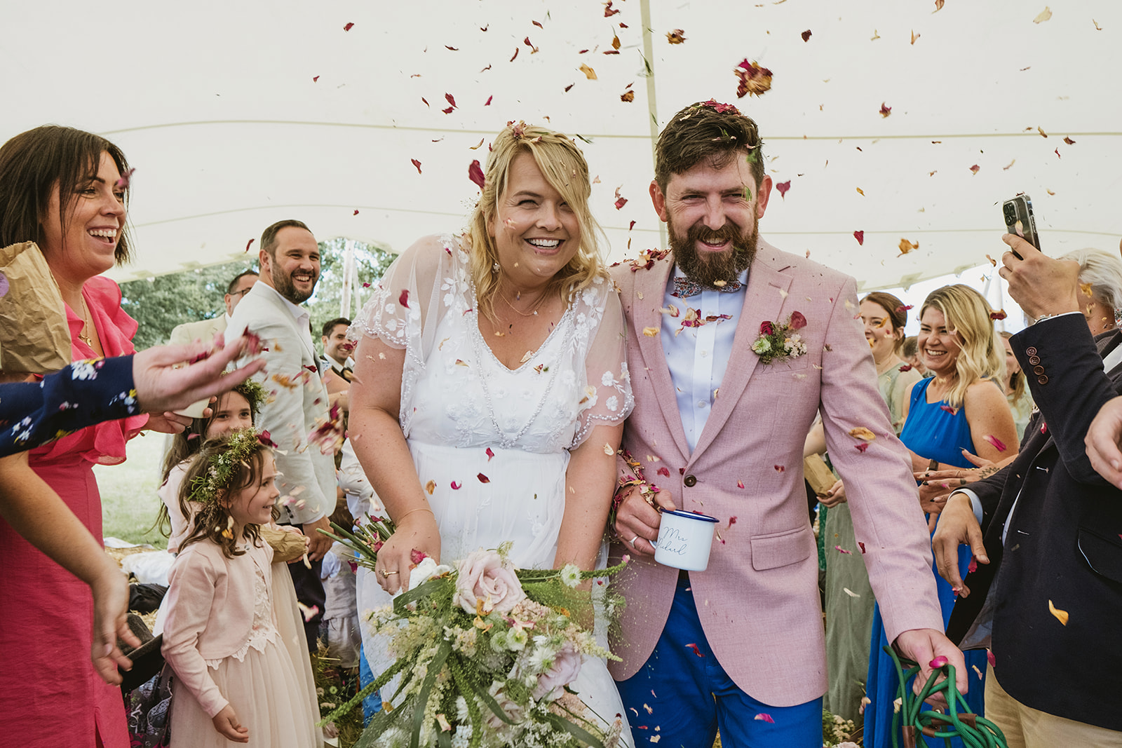 rainy outdoor garden wedding in Kent with candid photography by York Place Studios