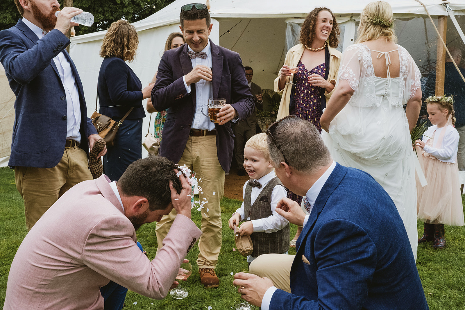 rainy outdoor garden wedding in Kent with candid photography by York Place Studios