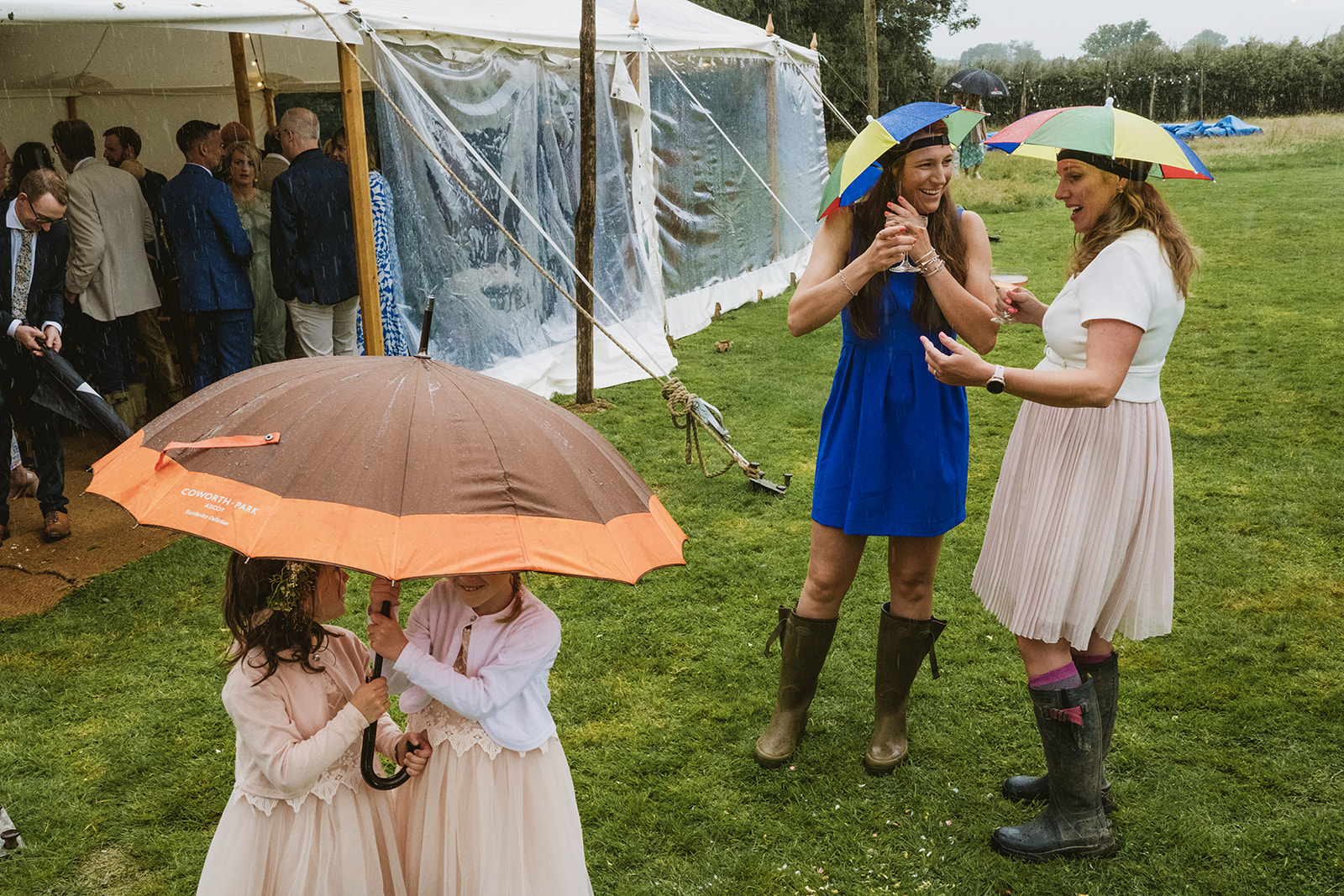 rainy outdoor garden wedding in Kent with candid photography by York Place Studios