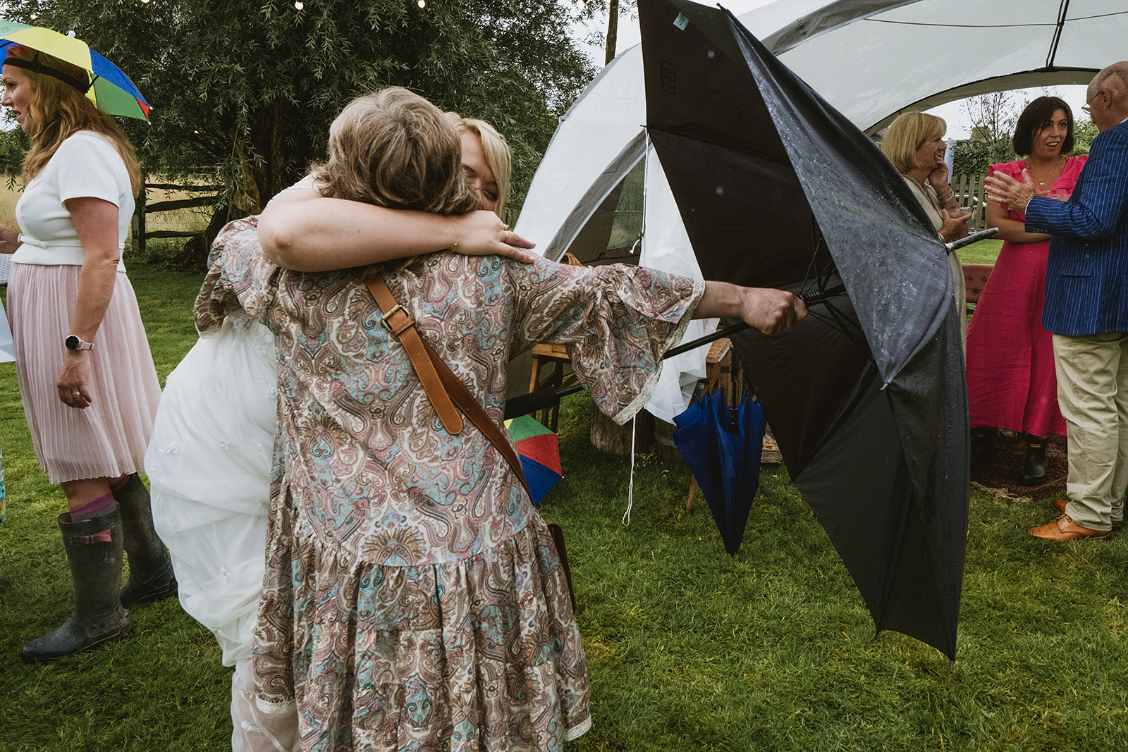 rainy outdoor garden wedding in Kent with candid photography by York Place Studios