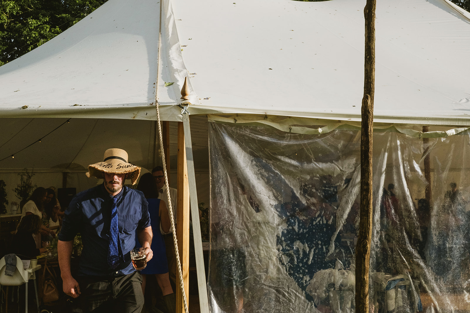 rainy outdoor garden wedding in Kent with candid photography by York Place Studios