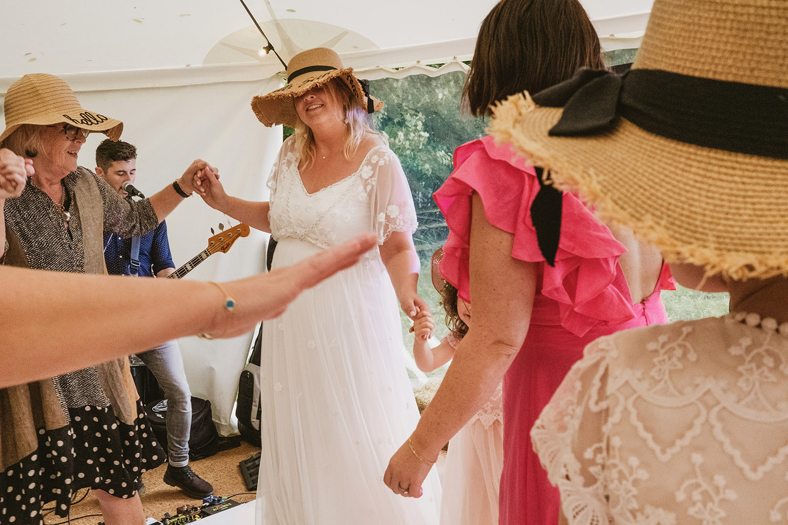 rainy outdoor garden wedding in Kent with candid photography by York Place Studios