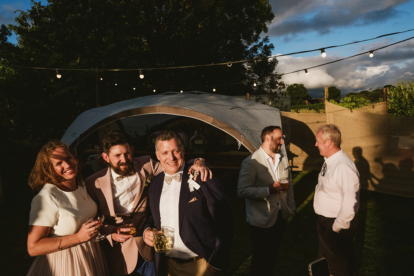 rainy outdoor garden wedding in Kent with candid photography by York Place Studios