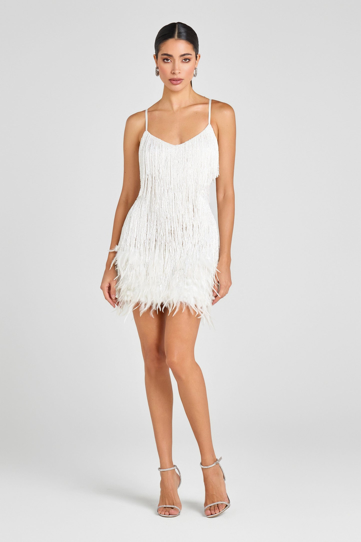 Feather embellished mini dress by Nadine Merabi