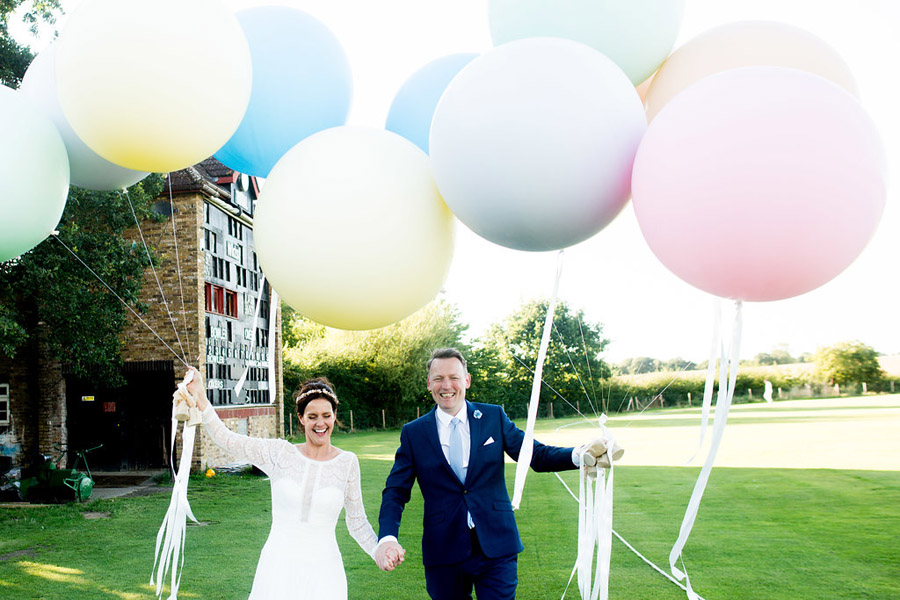 Pastel balloons for a modern wedding at Shenley, with images by Nicola Norton Photography (46)