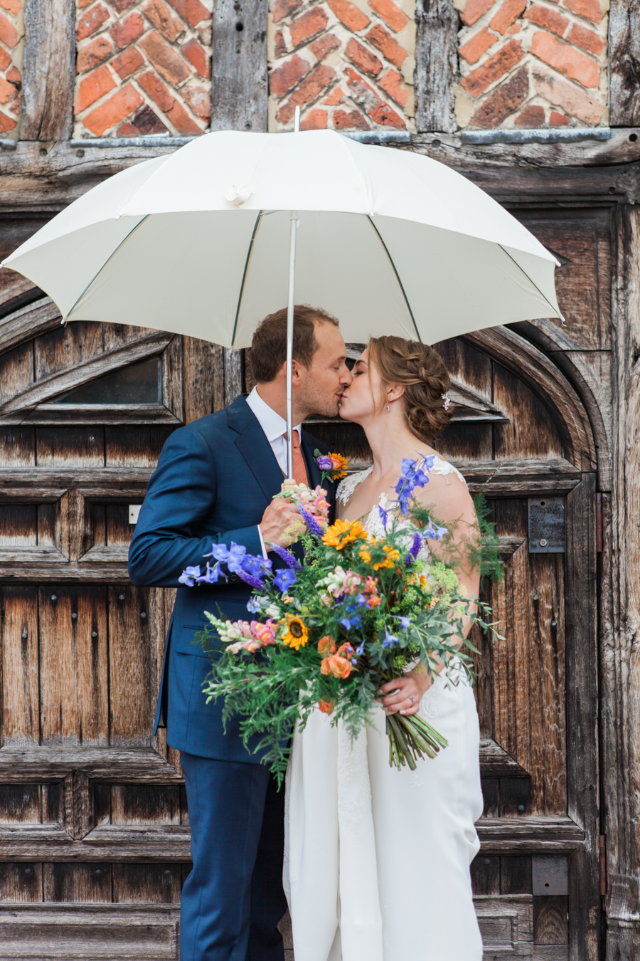 Sunflowers, roses and a beautiful backless wedding dress for this gorgeous Great Fosters wedding. Images by Amanda Karen Photography (19)