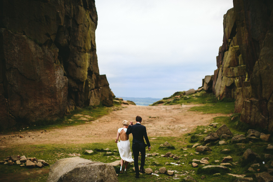 Bride and groom in a wild and rugged mountain setting
