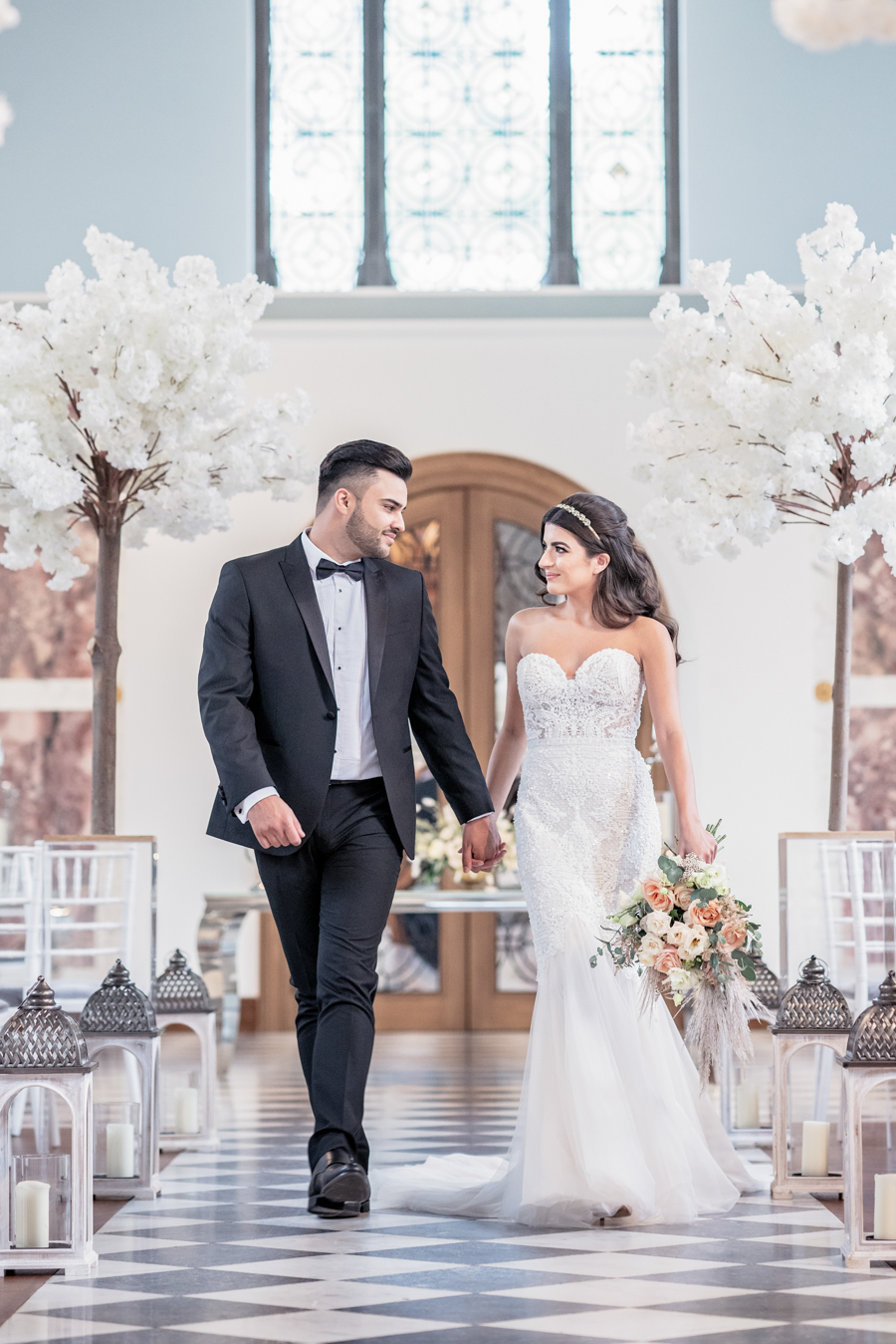 A luxuriously glam British-Indian wedding editorial in a grand English mansion hall