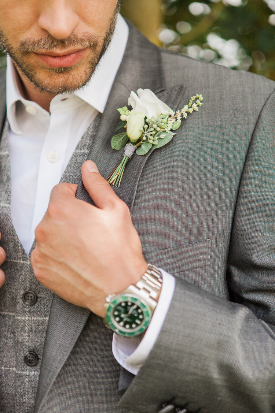 Norfolk wedding inspiration with tumbling green foliage, olive branch styling and a bride and groom in relaxed casual outfits, image credit Amanda Karen Photography