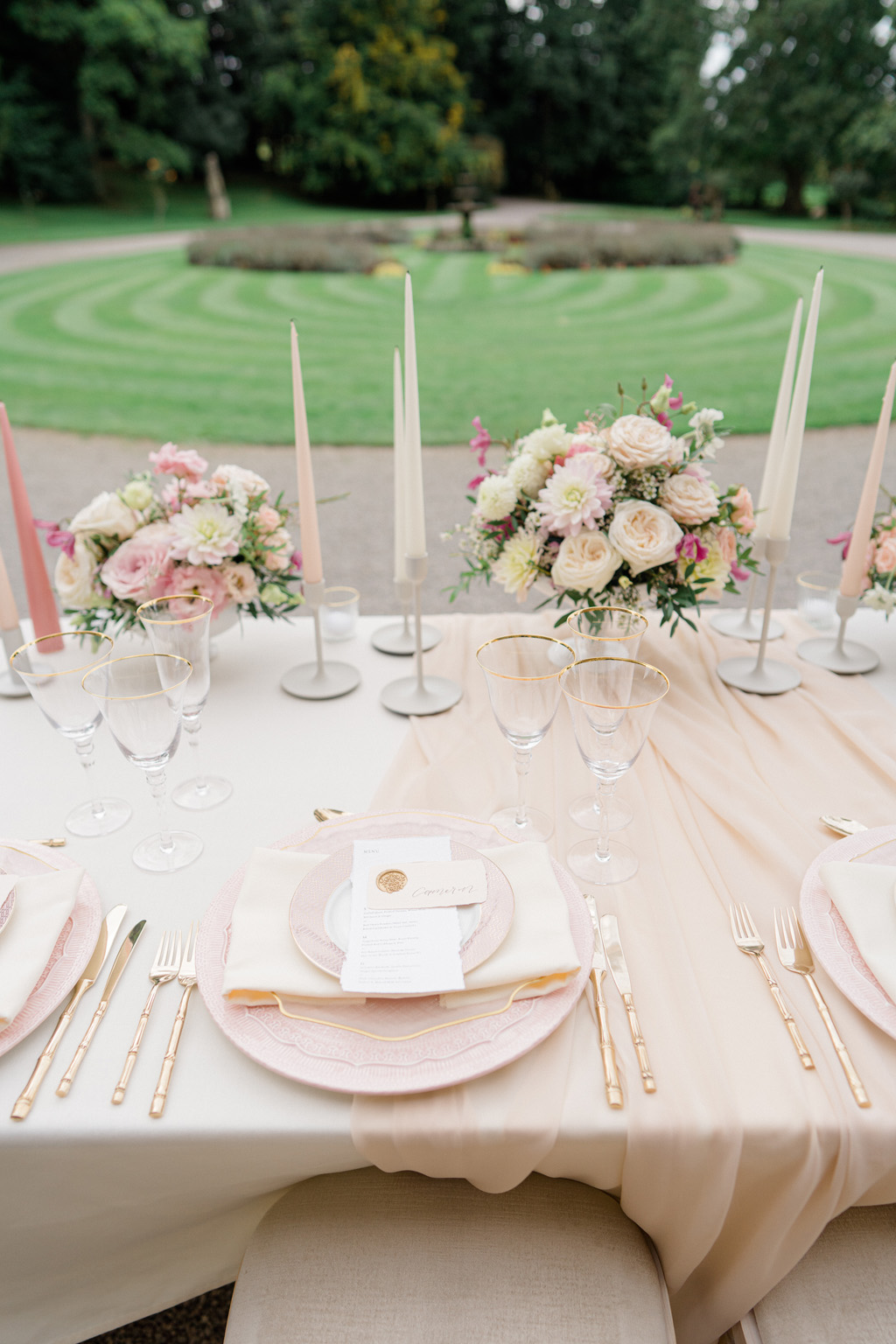 Clearwell Castle bride and groom photoshoot with white and pink floral inspiration
