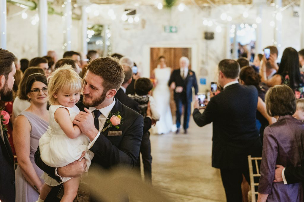 authentic and natural photography from Matt and Kate's Holmes Mill wedding in Clitheroe. There are children playing and none of the images are posed