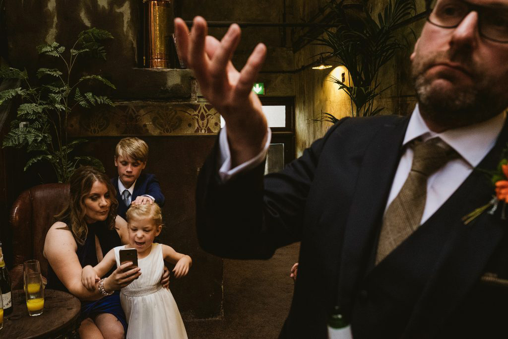 authentic and natural photography from Matt and Kate's Holmes Mill wedding in Clitheroe. There are children playing and none of the images are posed