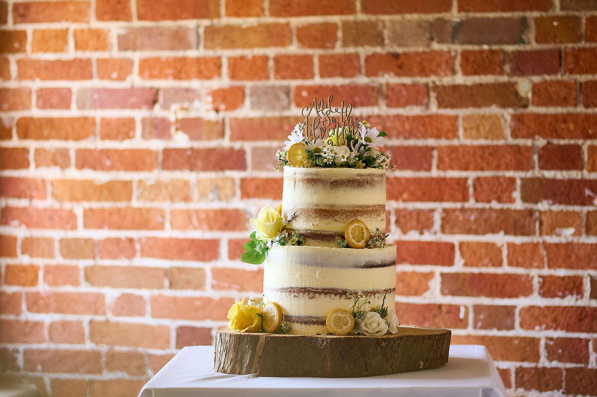 Joe and Jess's elegant rustic wedding at Sopley Mill. We love their bright yellow florals, the rustic ambience of the mill and the photos by Libra Photographic