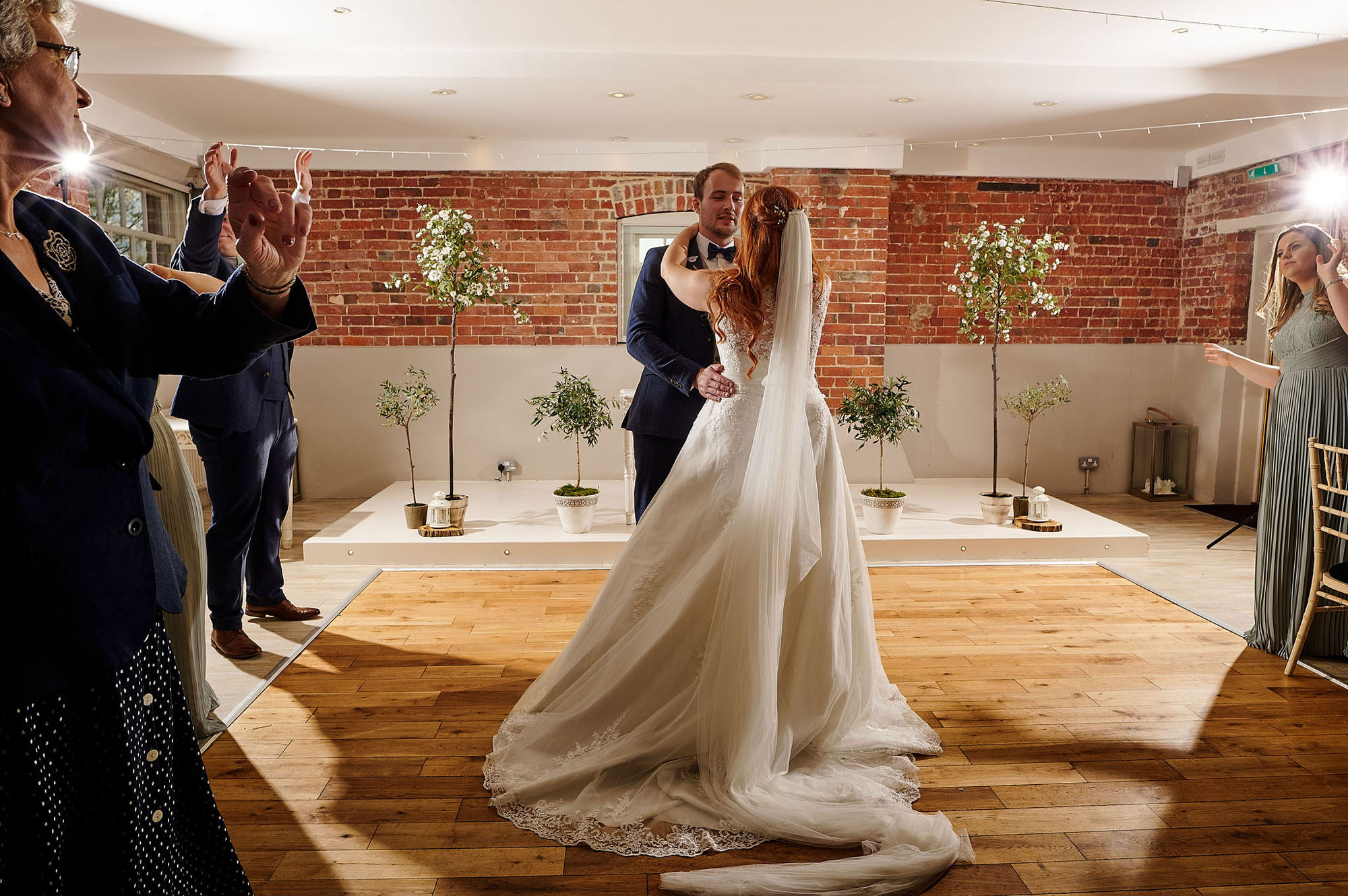 Joe and Jess's elegant rustic wedding at Sopley Mill. We love their bright yellow florals, the rustic ambience of the mill and the photos by Libra Photographic