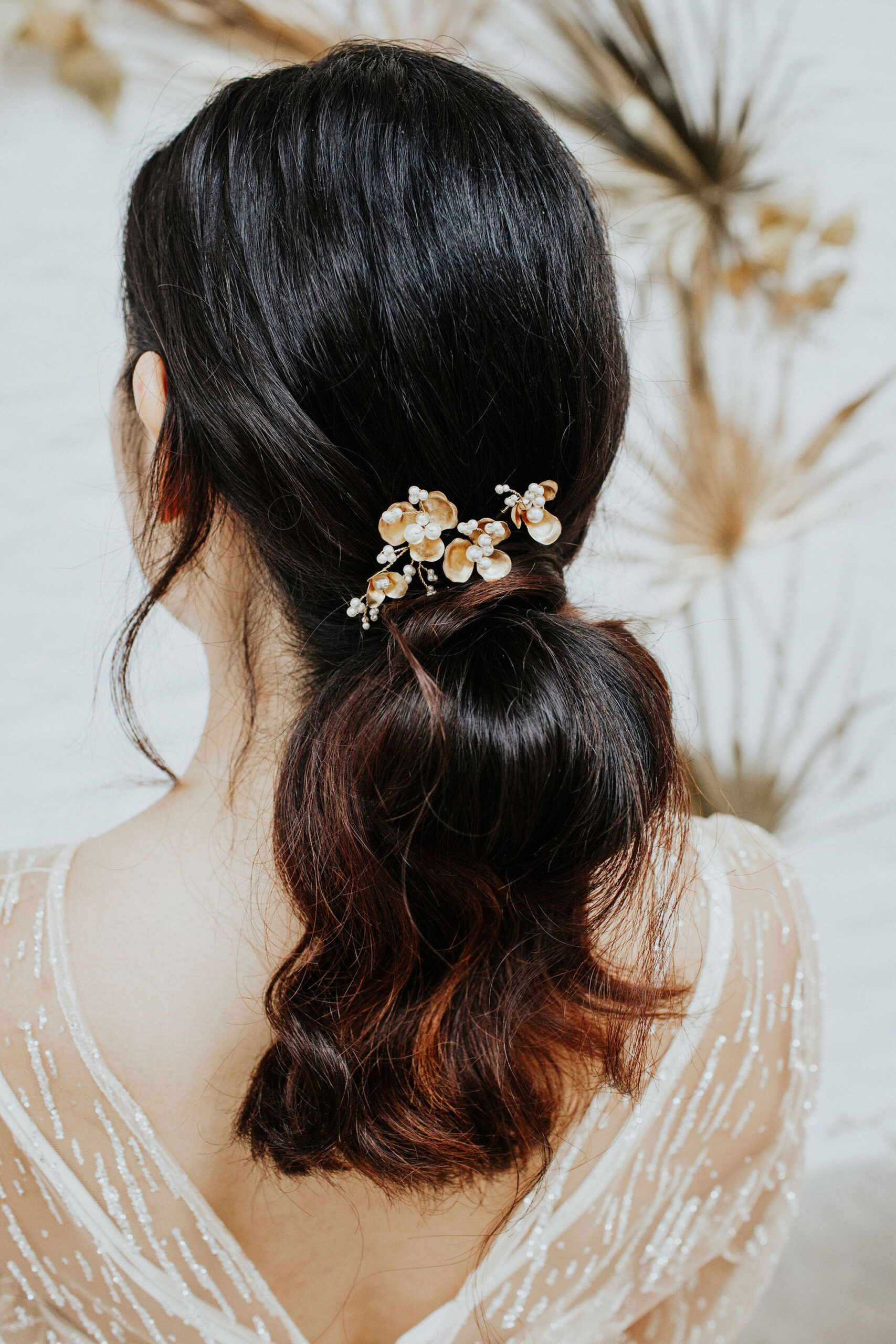 bespoke UK bridal accessories by Clare Lloyd with delicate floral designs. Captured by Oxi Photography