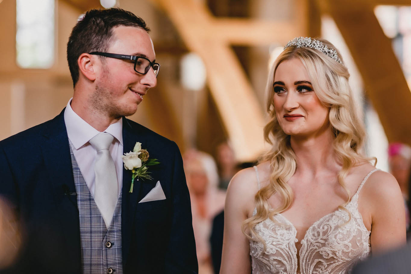 Katy and Ryan's Oakwood at Ryther wedding with lace embroidered dress and the groom wearing glasses. Credit Heather Butterworth Photography