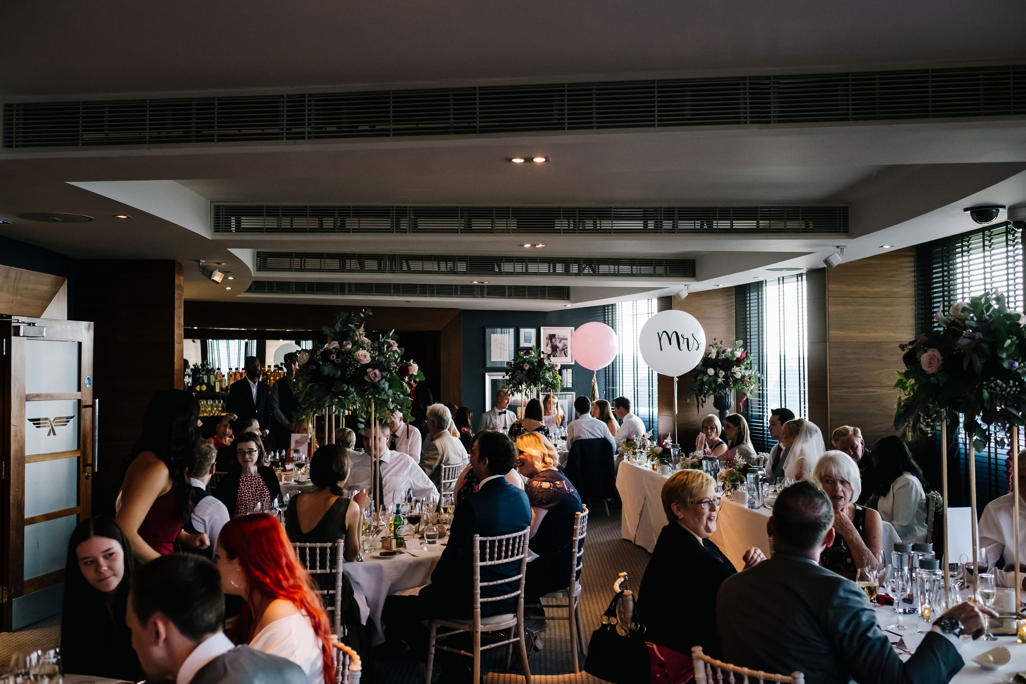 Carly and Dan's chic Aviator wedding with burgundy accents and gorgeous photos by Kristian Leven Photography Hampshire