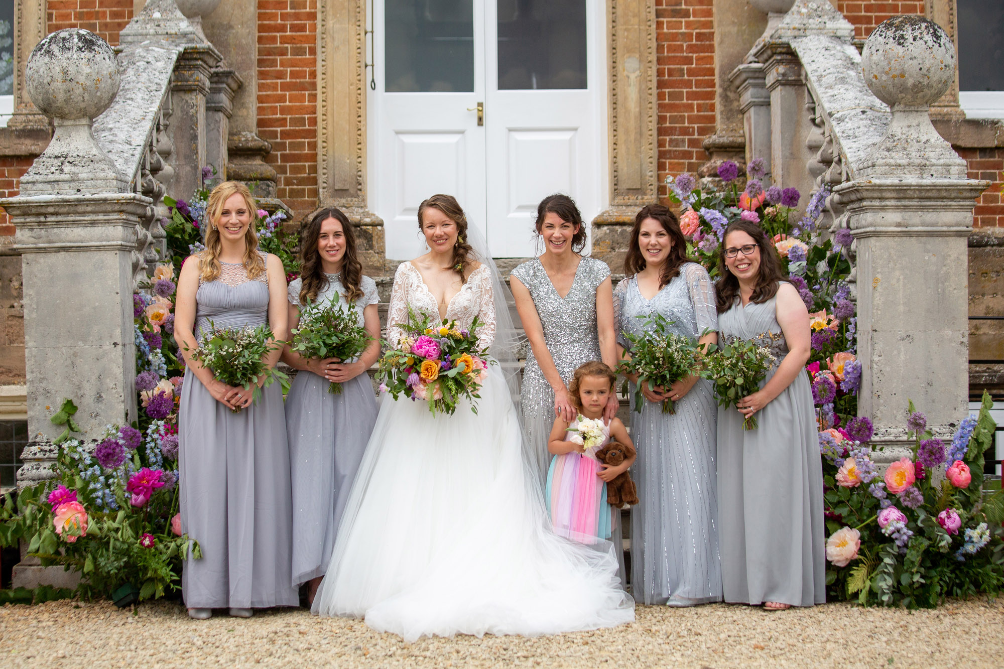 A gloriously colourful and fun wedding at Crowcombe Court with stunning florals, images by Somerset photographer Martin Dabek