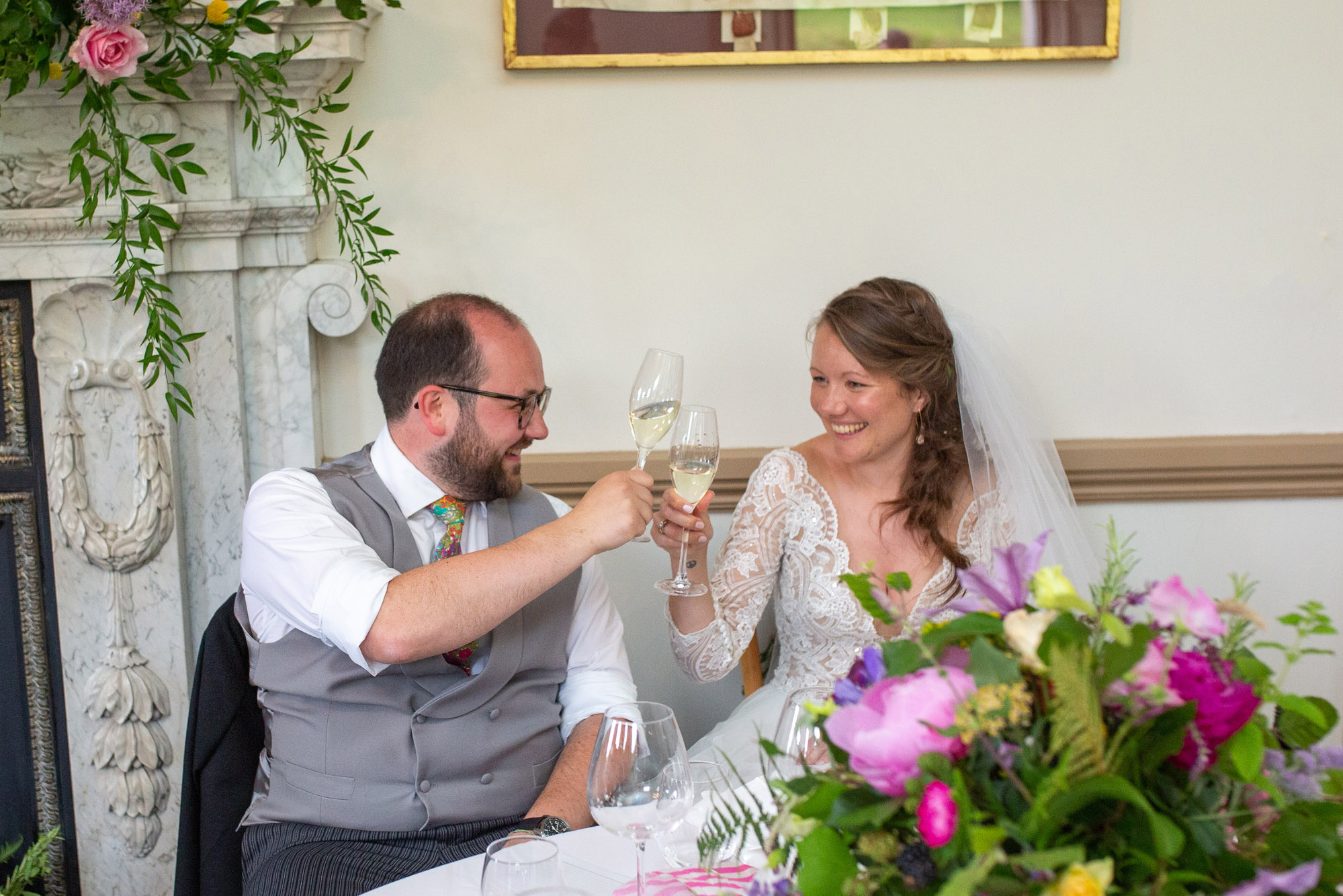A gloriously colourful and fun wedding at Crowcombe Court with stunning florals, images by Somerset photographer Martin Dabek