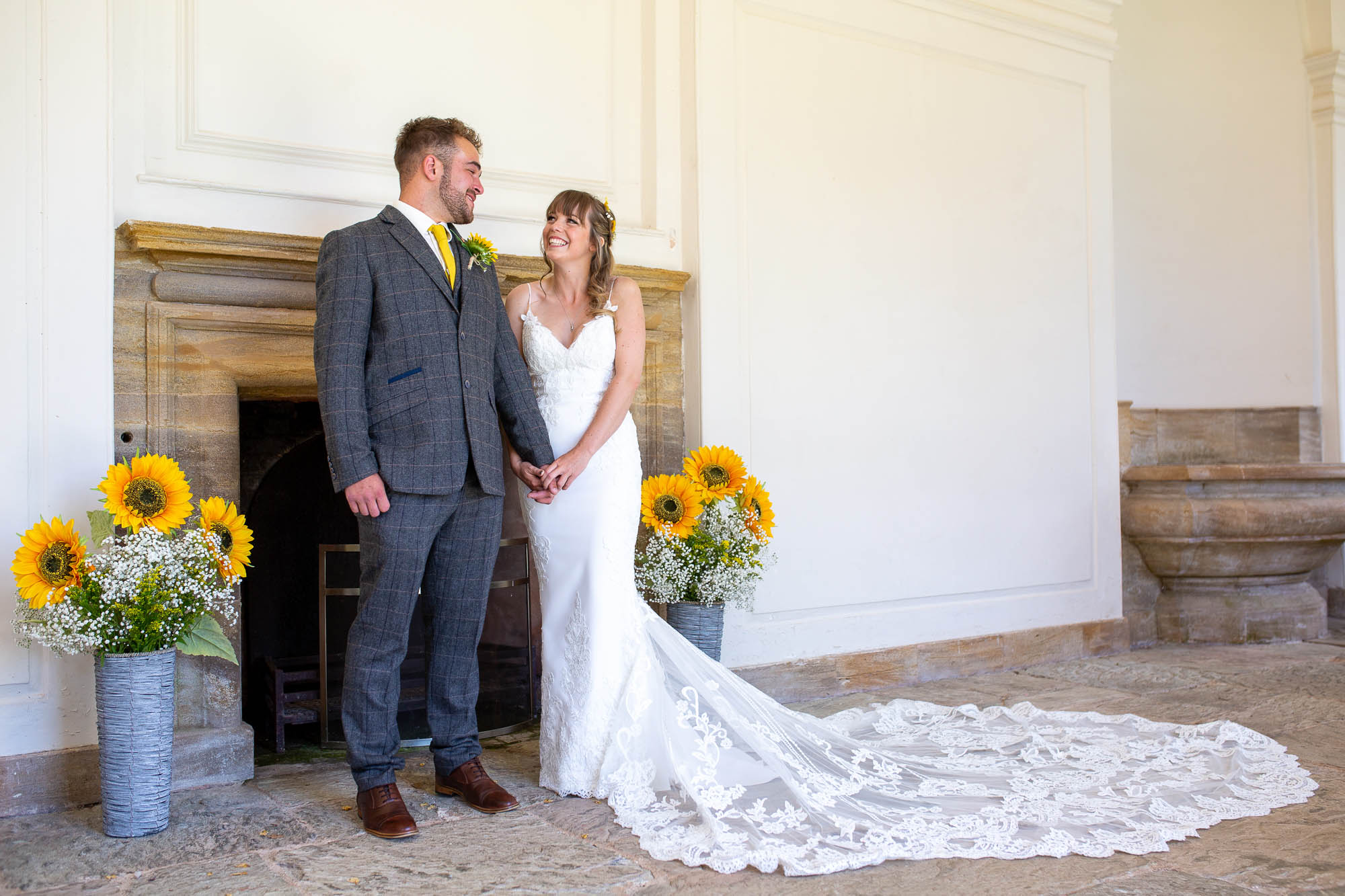 Meg wears an Enzoani dress for her summer wedding to Joe at sunny Hestercombe Gardens. With Martin Dabek Photography