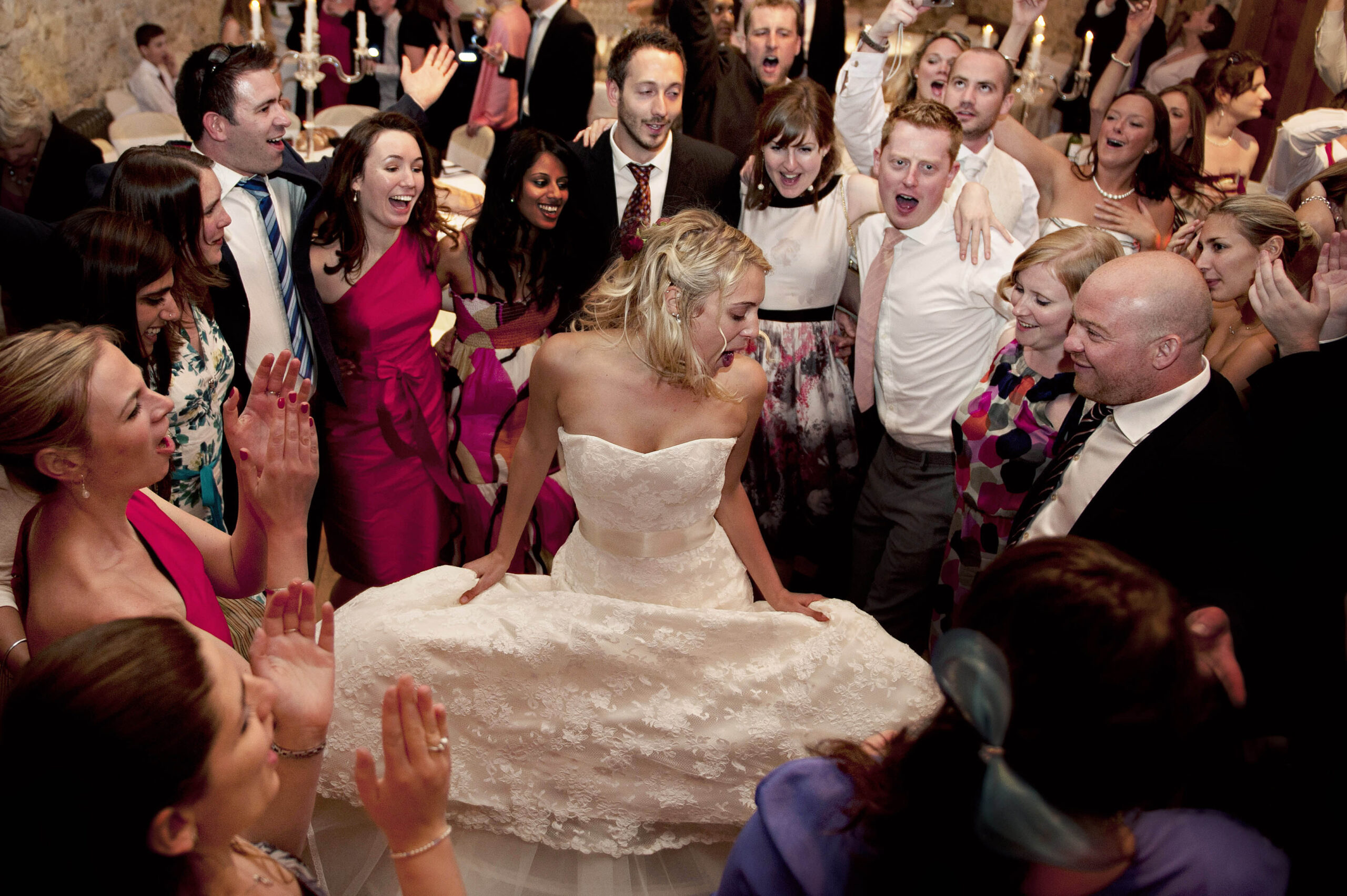 Bride taking centre stage on the dancefloor, by Tori Deslauriers Photography
