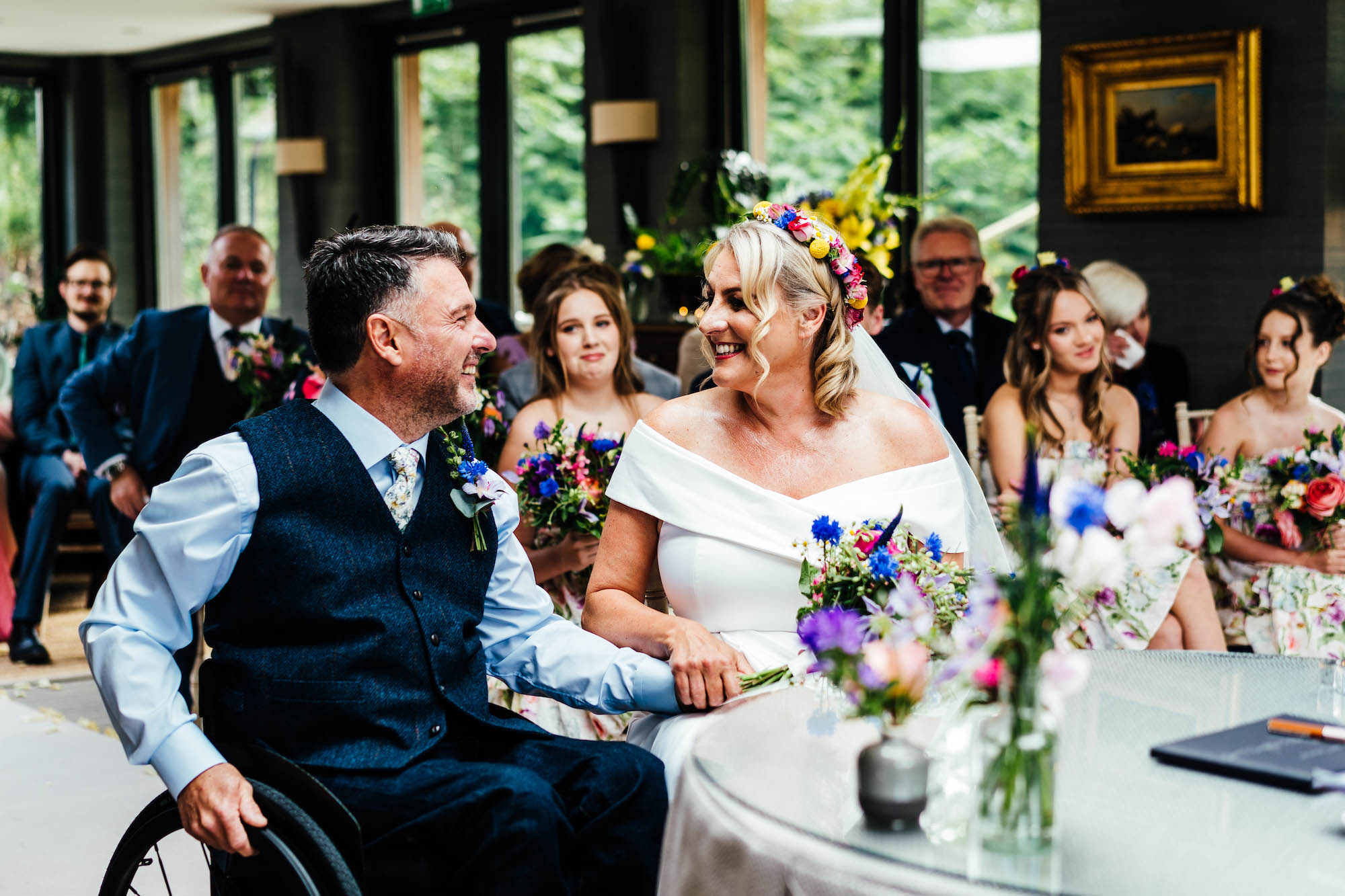 Joyful photo of a bride and groom at their wedding - by Hannah Hall Photography
